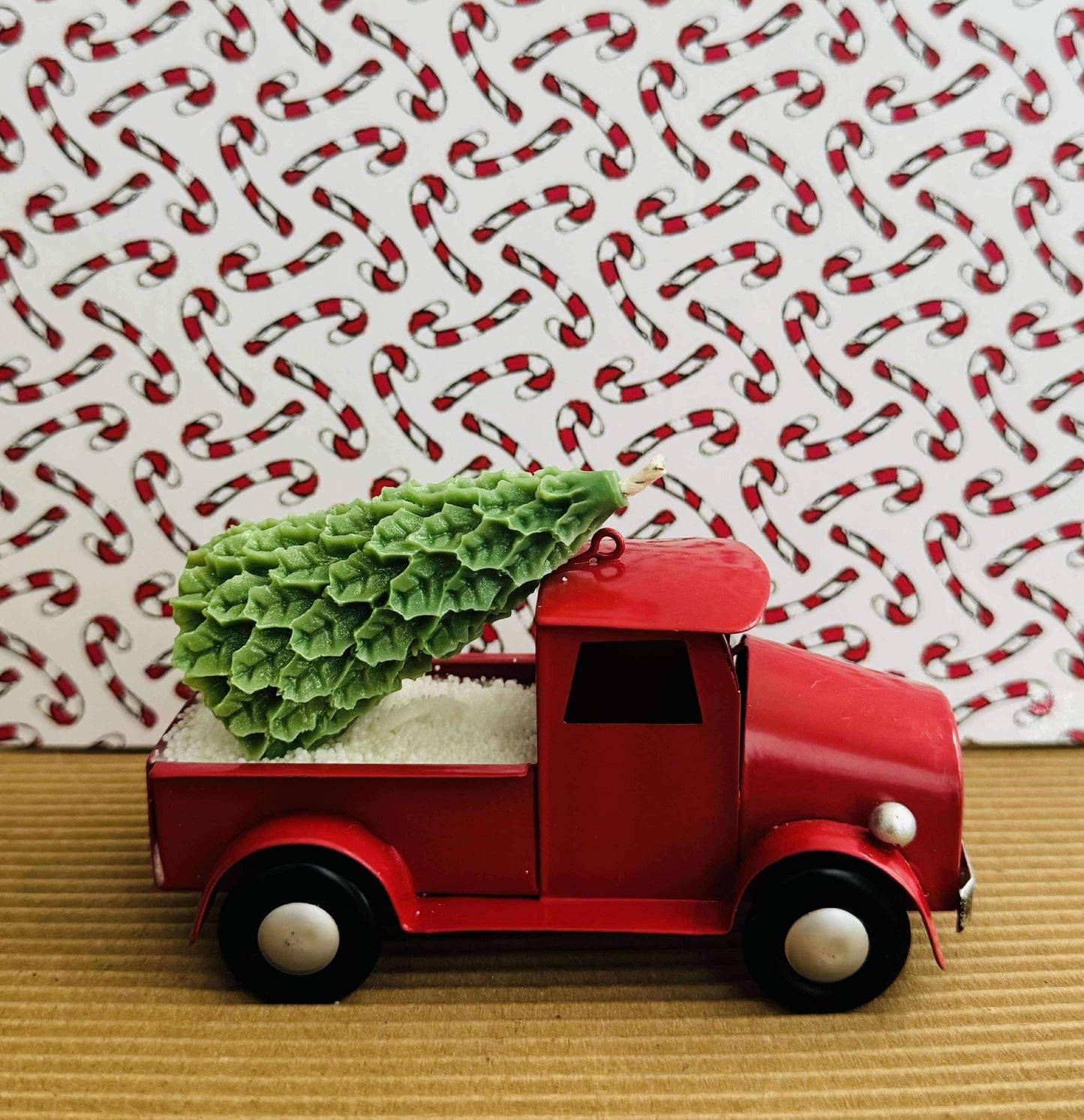 Small truck with Christmas tree